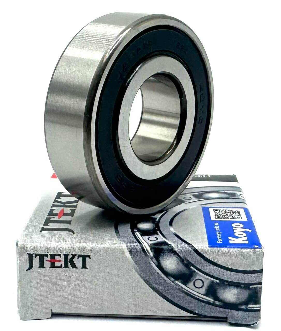 KOYO 6203-2RS Bearing on JTEKT packaging, showcasing the deep groove ball bearing design with rubber seal.