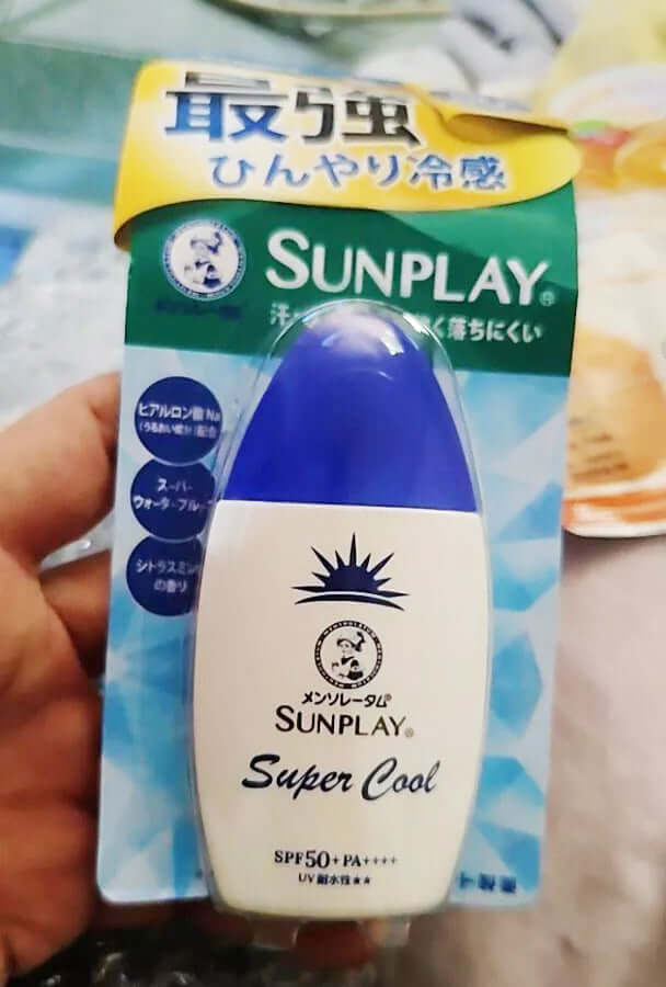 Mentholatum Sunplay Super Cool Sunscreen Watery Icy Cool Lotion in hand, packaging shows SPF 50 PA, perfect for UV protection.