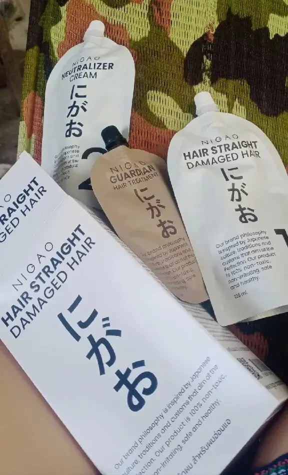 NIGAO Hair Straight Cream and other products for damaged hair in packaging, showcasing Japanese hair care solutions.