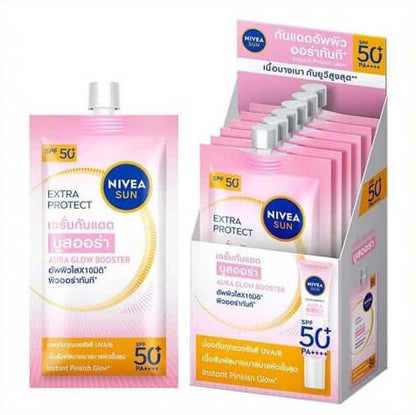 A set of NIVEA Sun Aura Glow Booster Serum in pink sachet and its display box