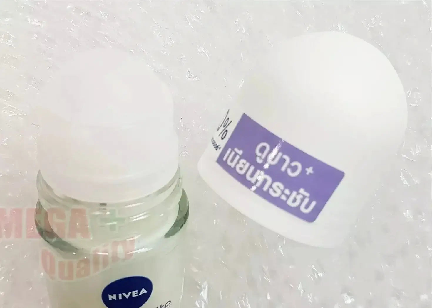 Nivea Extra Firm Roll On opened bottle showing applicator roller ball and cap