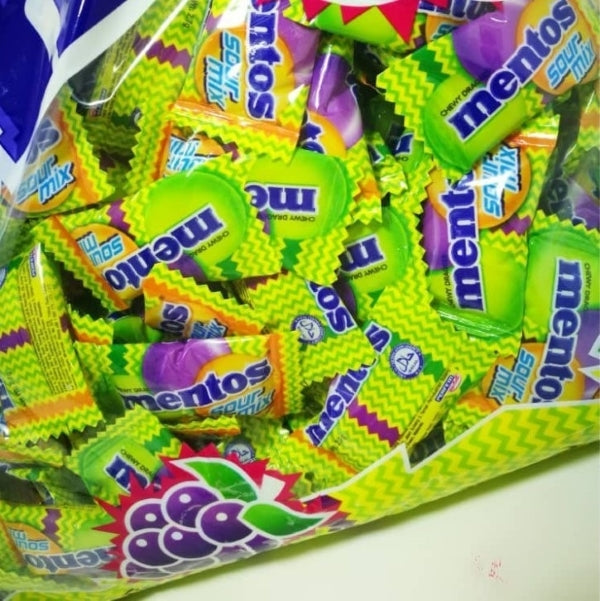 Close-up of Mentos Sour Mix Chewy Dragees 270g candies in colorful sour mix wrapping