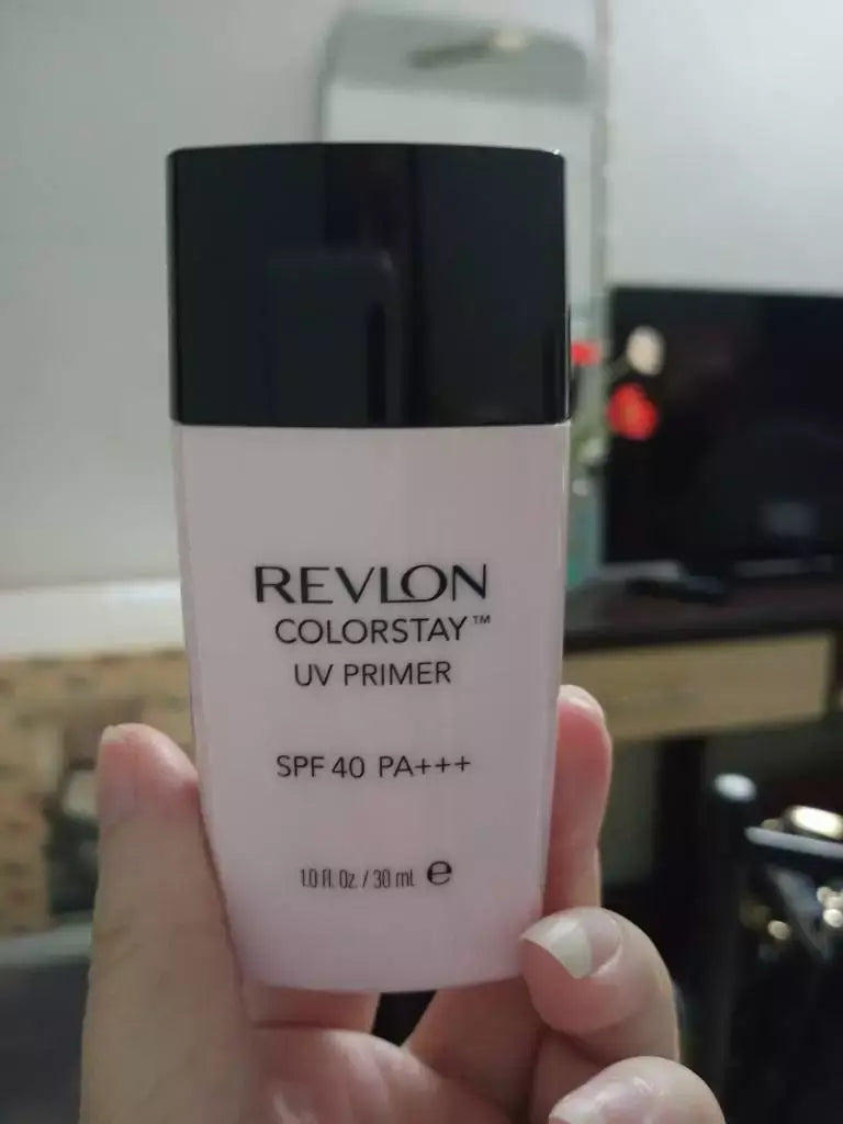 Revlon ColorStay UV Primer SPF 40 PA+++ Makeup Sunscreen Base 30ml in a hand