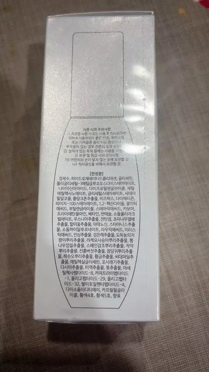 SEWA Age White Serum packaging details with Korean text and ingredients list for skincare restoration.