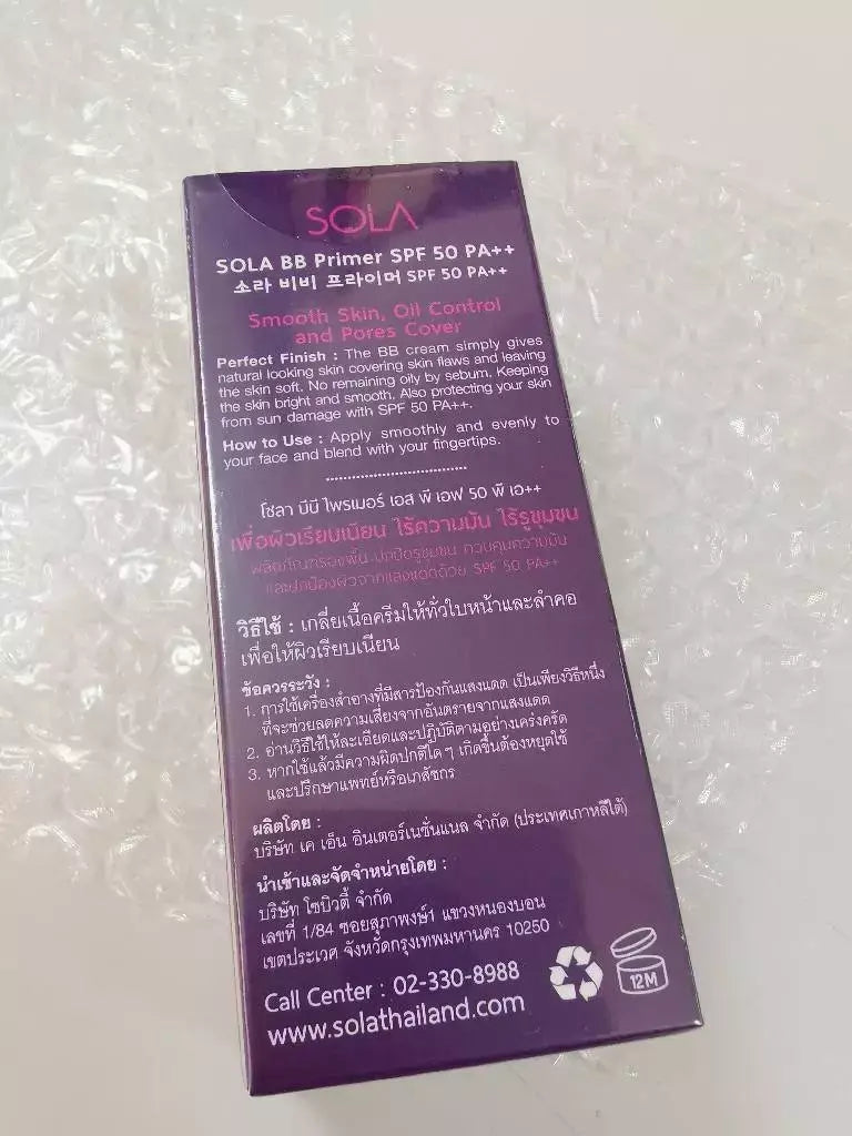 Close-up photograph focusing on the back packaging of the SOLA BB Primer sachet, clearly showing the list of ingredients and detailed product usage instructions.