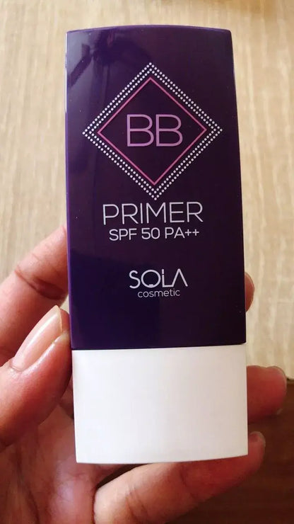 SOLA BB Primer SPF50 PA++ in hand, showcasing its packaging for smooth coverage and oil control.