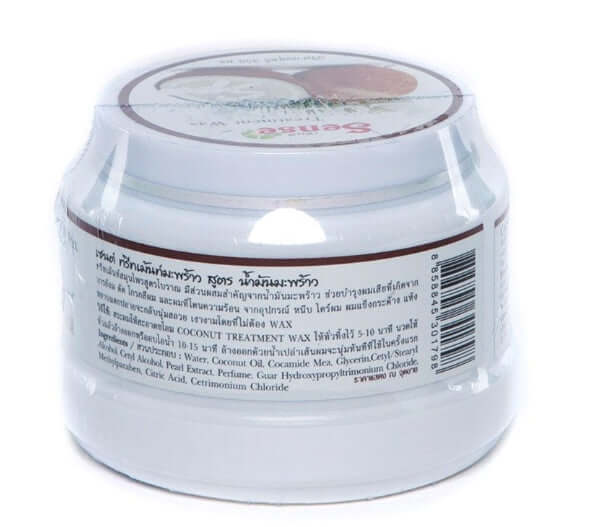 The back view of a Sense Coconut Hair Treatment jar showing instructions and a product label with some text visible.