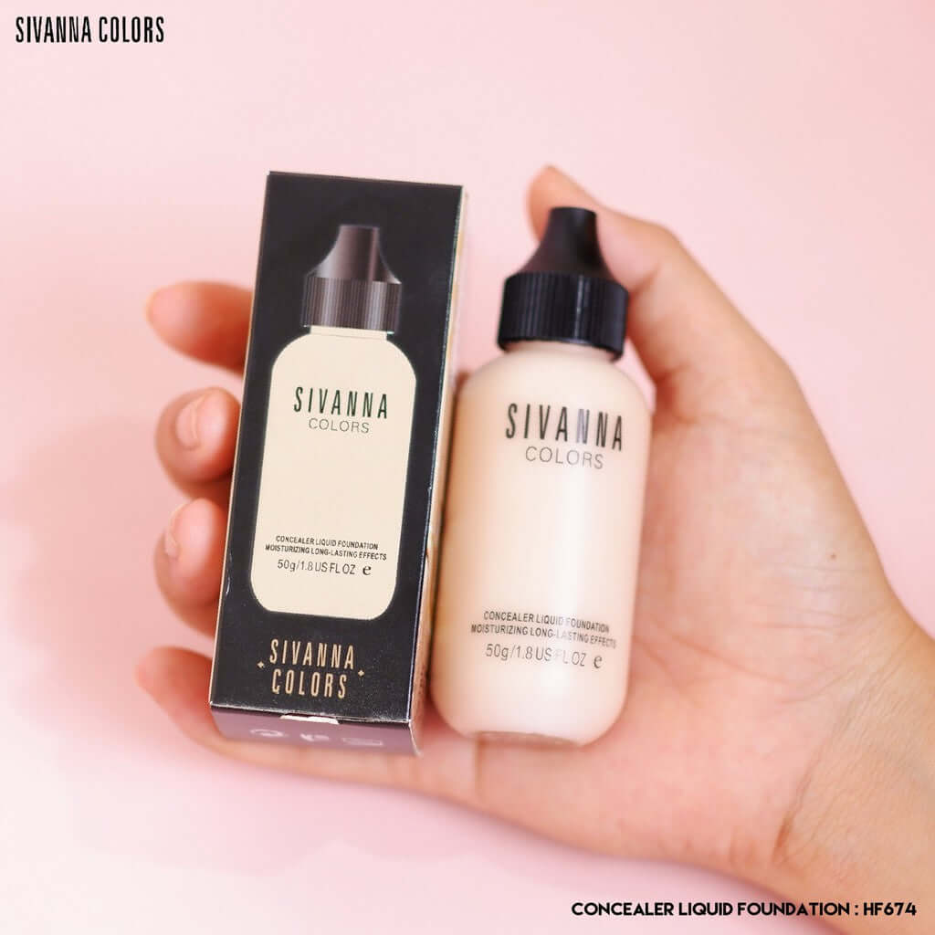 Sivanna Colors Velvet Foundation Touch Concealer Liquid HF674 50ml packaging held in hand on a pink background.