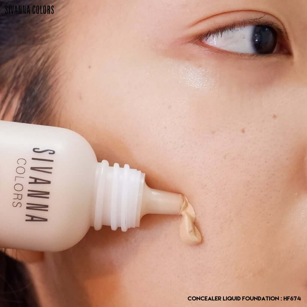 Sivanna Colors Velvet Foundation Touch Concealer Liquid HF674 being applied, showcasing its smooth texture and coverage on skin.