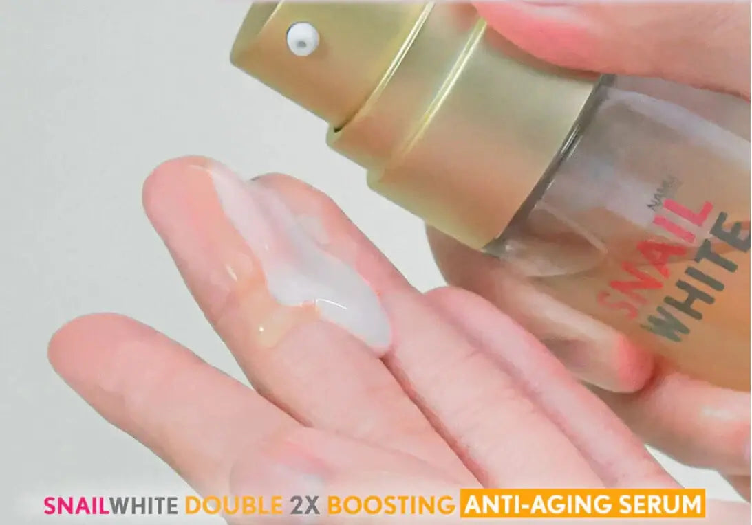 Snail White Double Boosting Serum Applied on Hand Texture Demonstration