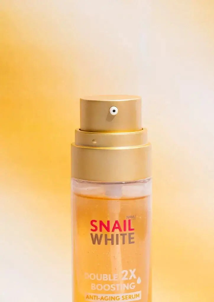 Snail White Double Boosting Serum Bottle Close Up with Dual Chamber Design
