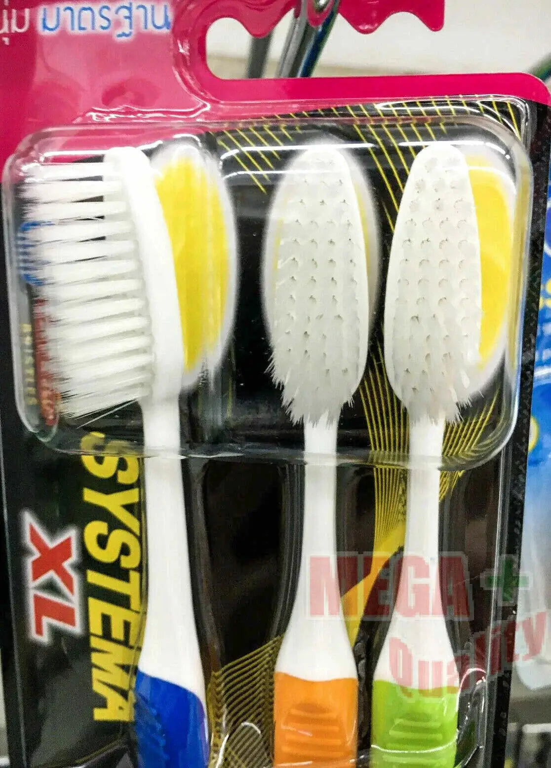 Close Up of Systema XL Toothbrush Head with Soft Slim Bristles in Pack