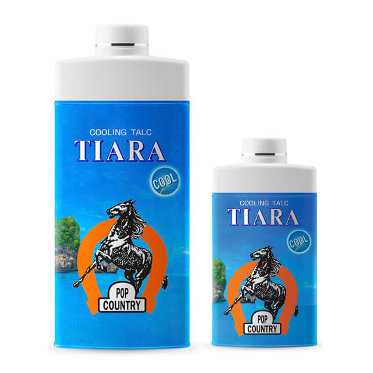 TIARA Cooling Talc Pop Country perfumed body powder bottles on a blue background, delivering cool refreshing fragrance.