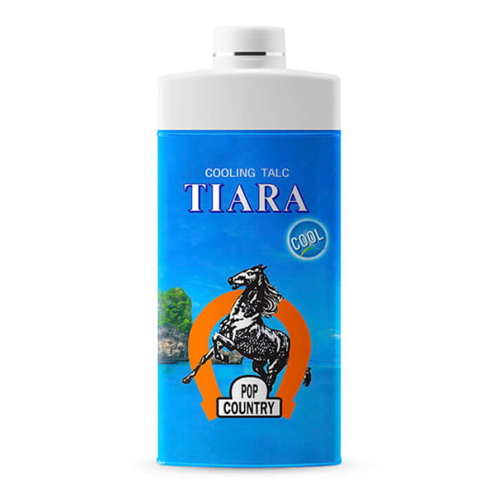 TIARA Cooling Talc Pop Country body powder 180g bottle with refreshing fragrance, cool sensation in a vibrant blue package.