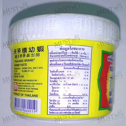 A close-up shot of the back of the Trachang shrimp paste jar, showing the nutritional information and ingredients list in Thai.