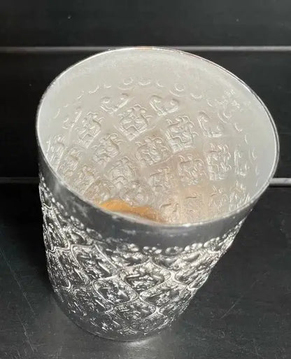 Thai Aluminum Cup top angle view showing inside capacity and ice water filled.