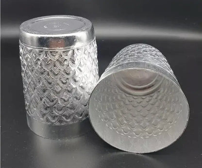 Thai Aluminum Cup pair showing side pattern and inside silver finish.