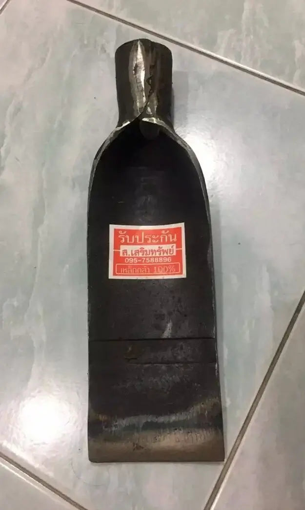 Thai Spade Head Shovel showing the cutting edge and durable steel design for gardening and farming.