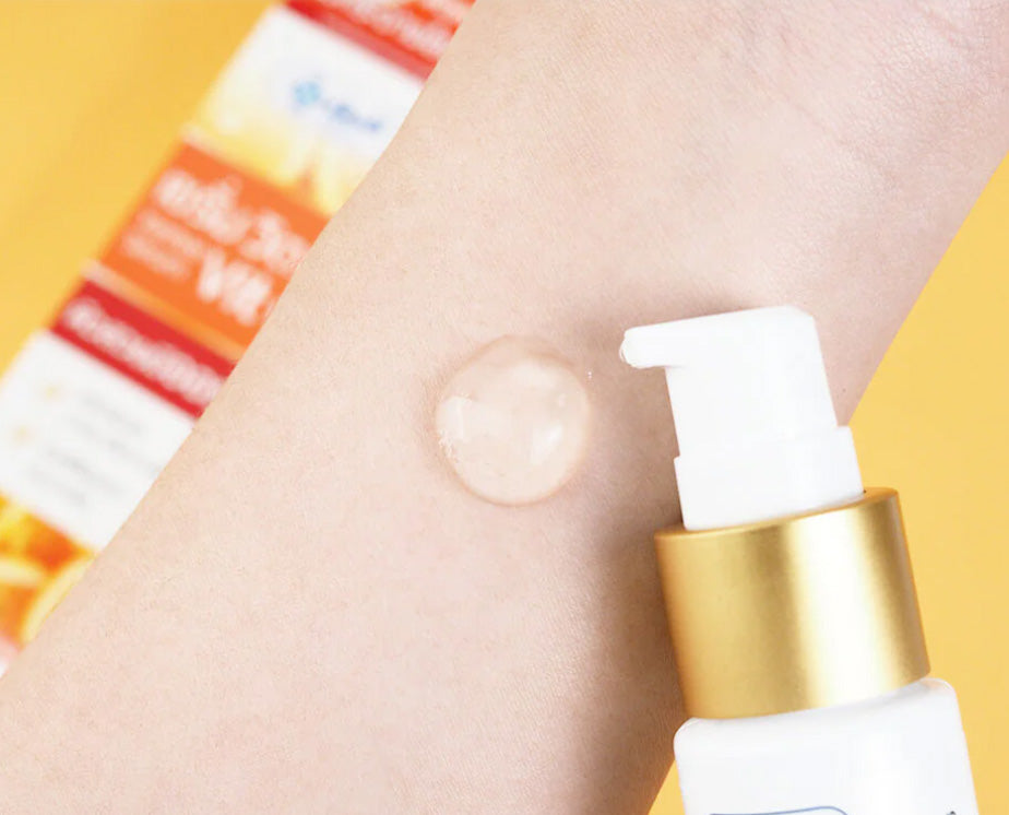 Yanhee Vit C Serum texture applied on skin showing lightweight smooth formula