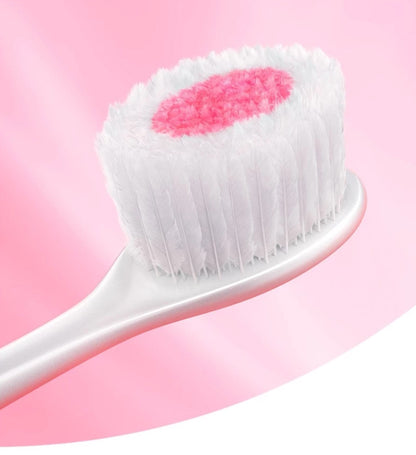 Colgate Cushion Clean Toothbrush close-up showing cushioned soft bristles with pink center for gentle deep clean