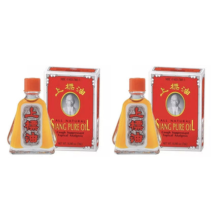 Two bottles of Siang Pure Oil Red 3cc with boxes on a white background for dizziness and headache relief
