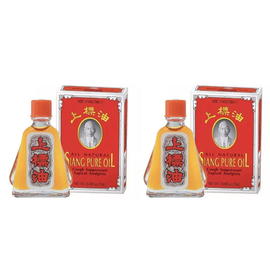 Two bottles of Siang Pure Oil Red 3cc with boxes on a white background for dizziness and headache relief