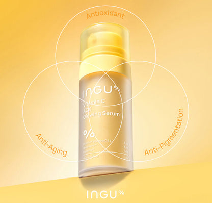 INGU Vitamin C AOX glowing serum shown with bright golden swirl background