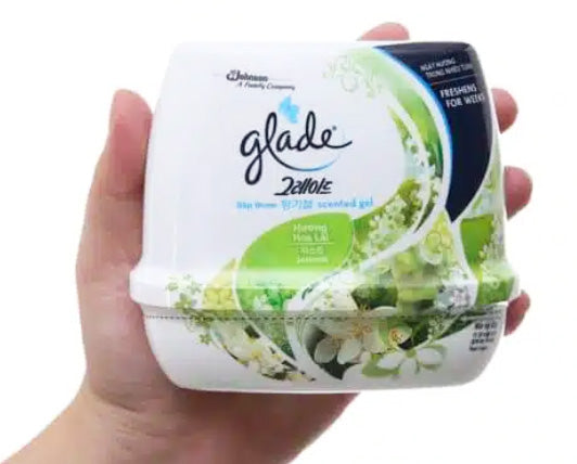 Glade Jasmine Gel Freshener product held in hand showing size