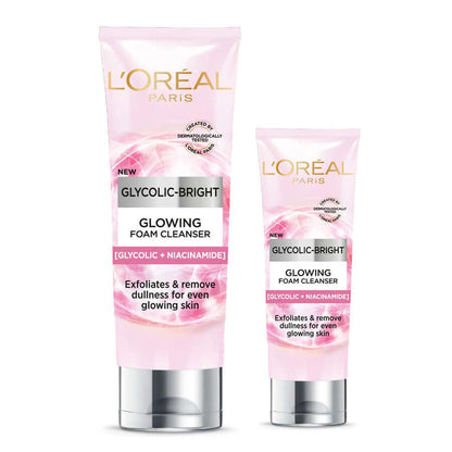 Two different sized pink tubes of LOreal Glycolic Bright Cleanser on a white background.