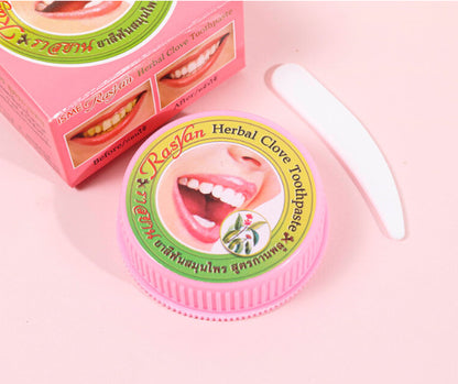 Rasyan ISME Herbal Clove Toothpaste 25g tin with spatula and packaging