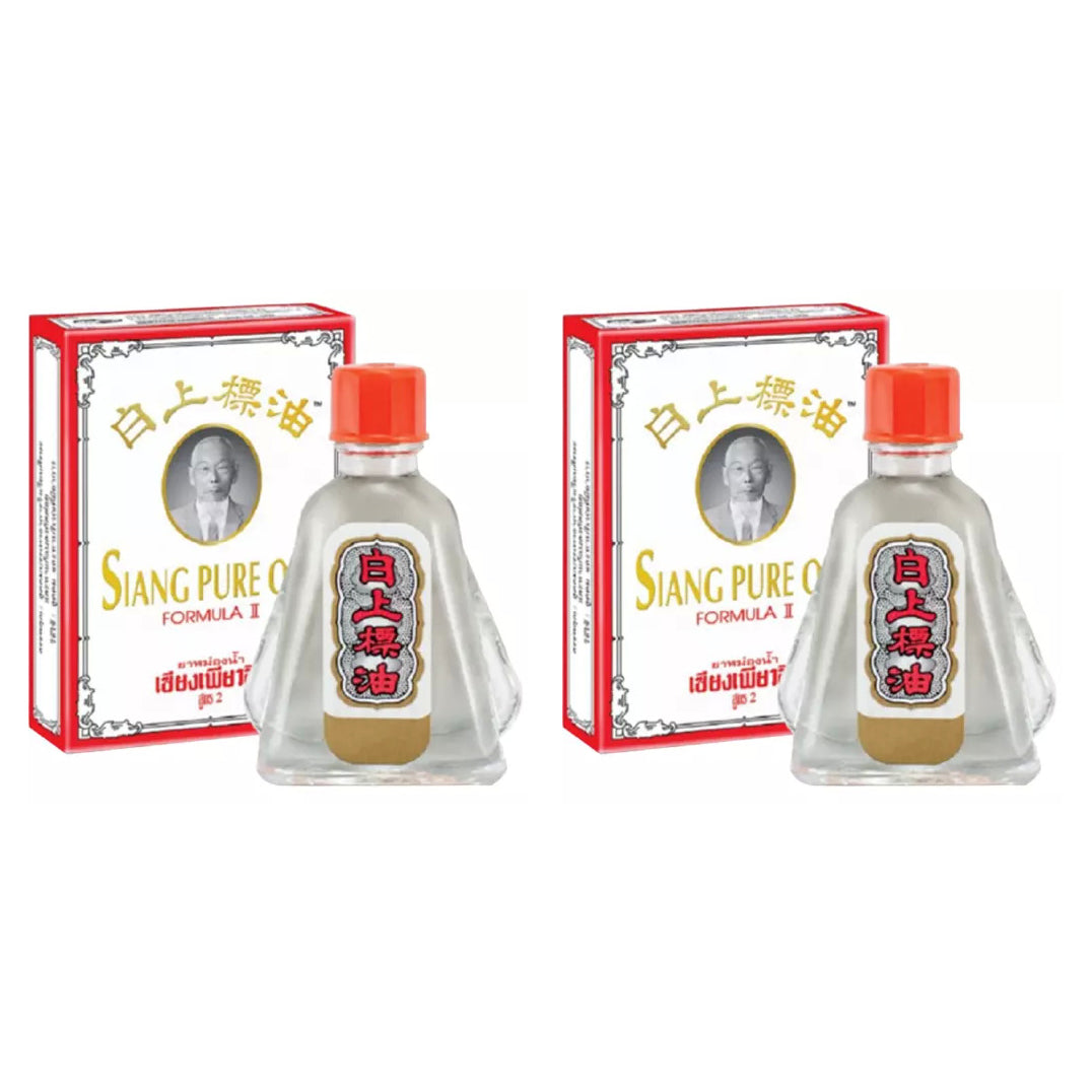 Two bottles of Siang Pure Oil Formula 1 with original red box for relief of dizziness muscle pain insect bites