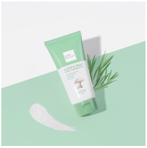 Baby Bright Acne Cleansing Foam tube flatlay on pastel background
