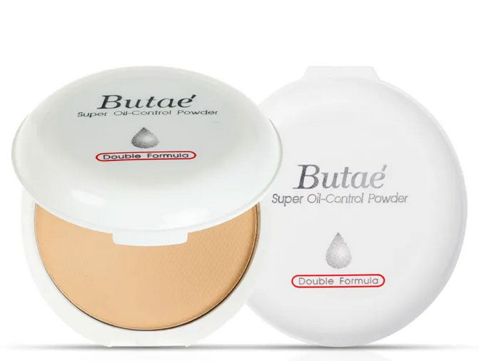 Butae Super Oil Control Powder compact open showing pressed powder and mirror