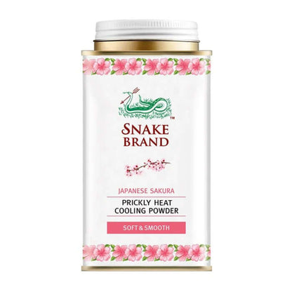 Snake brand prickly heat powder Soft Smooth Japanese Sakura 140g front view showing cherry blossom design and pink floral packaging.