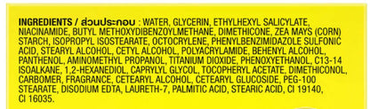 Close up of the ingredient list and warning label on Olay Natural Aura Cream yellow packaging