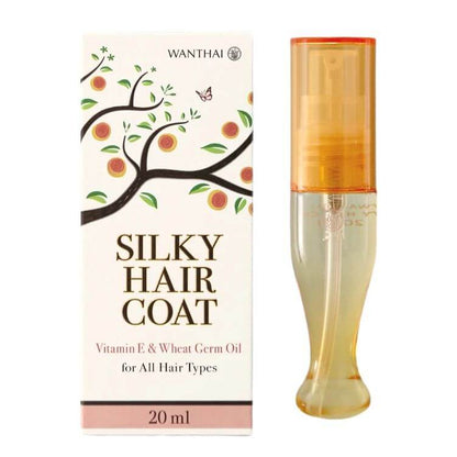 A slender glass bottle of Wanthai Silky Hair Coat 20ml standing upright beside its product packaging box.