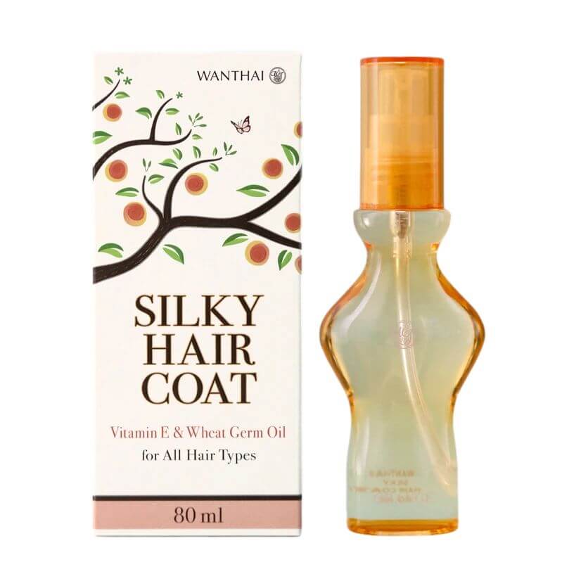 An 80ml bottle of Wanthai Silky Hair Coat next to its white packaging box showing the tree illustration.