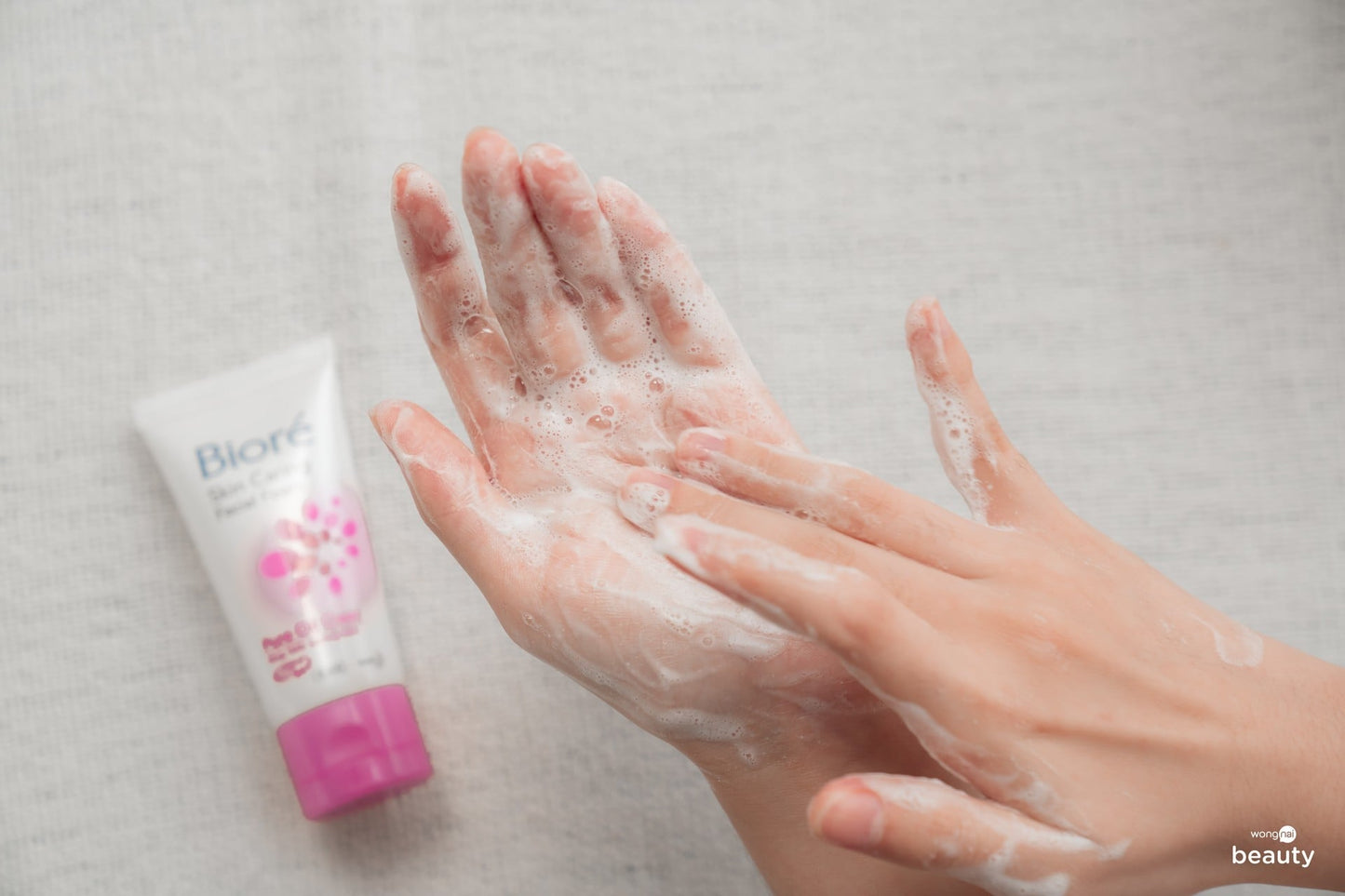 Biore Pure Oil Clear Foam gentle facial cleansing foam applied on hands
