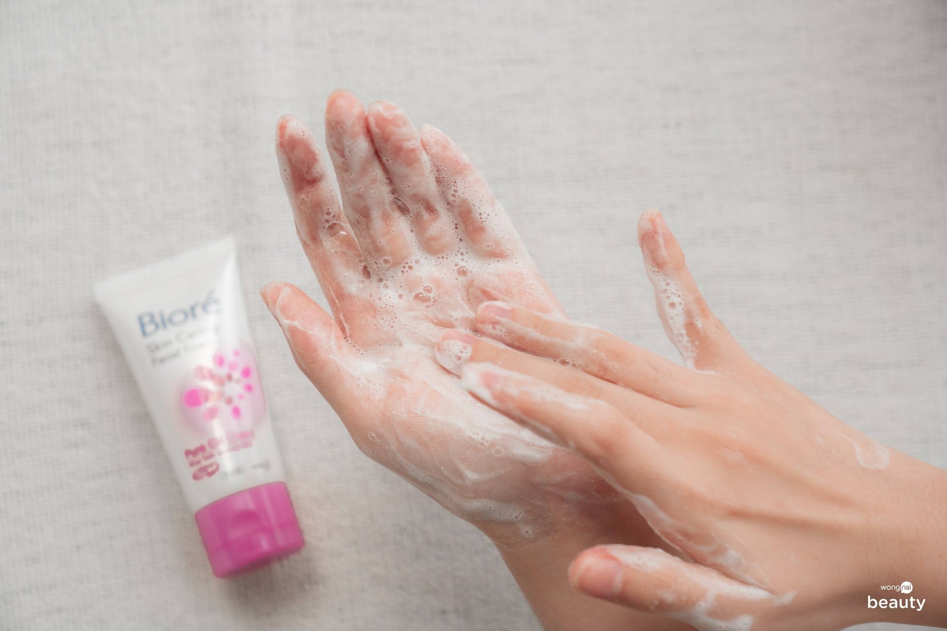 Biore Pure Oil Clear Foam gentle facial cleansing foam applied on hands