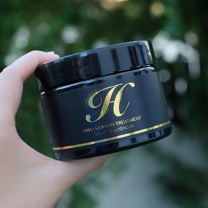 Hiso Keratin Treatment jar held outdoors showing product packaging