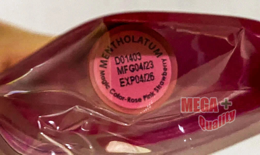 Close-up of the balm showing Crystal Pink label and stick texture