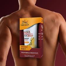 Tiger Balm Neck and Shoulder cream applied on upper back for muscle relief