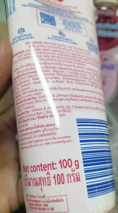 Close-up of johnsons baby cream face body back packaging highlighting net content text