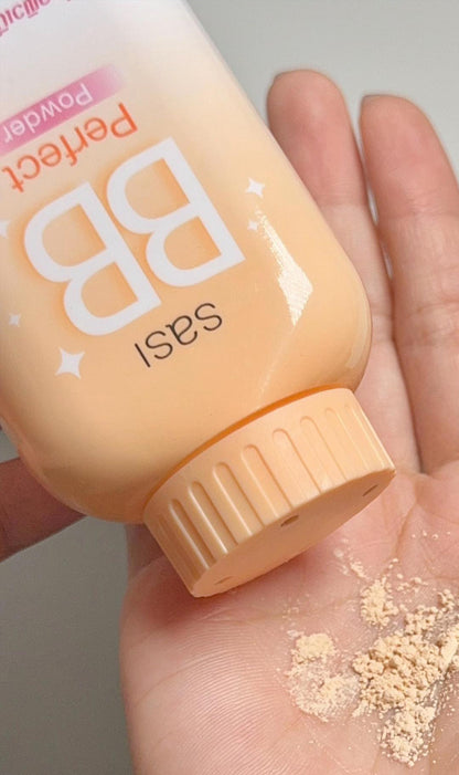 Sasi BB Perfect Powder loose powder bottle held in hand for size reference