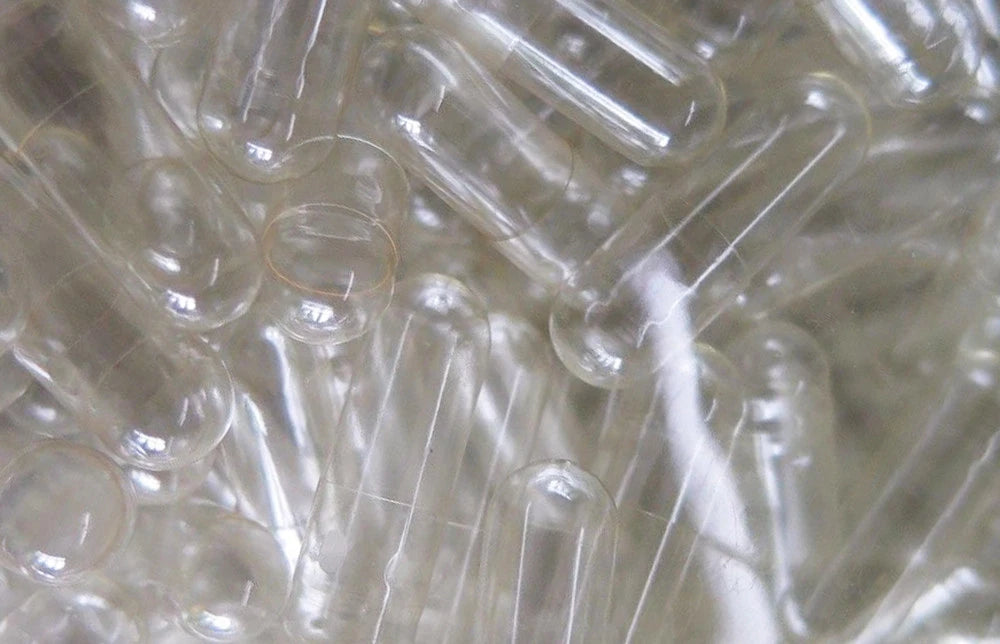  Empty Vegetarian Capsules Size 0 in clear plastic bag close-up view