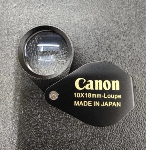 Canon 10x Magnifier compact loupe lens close up front detail