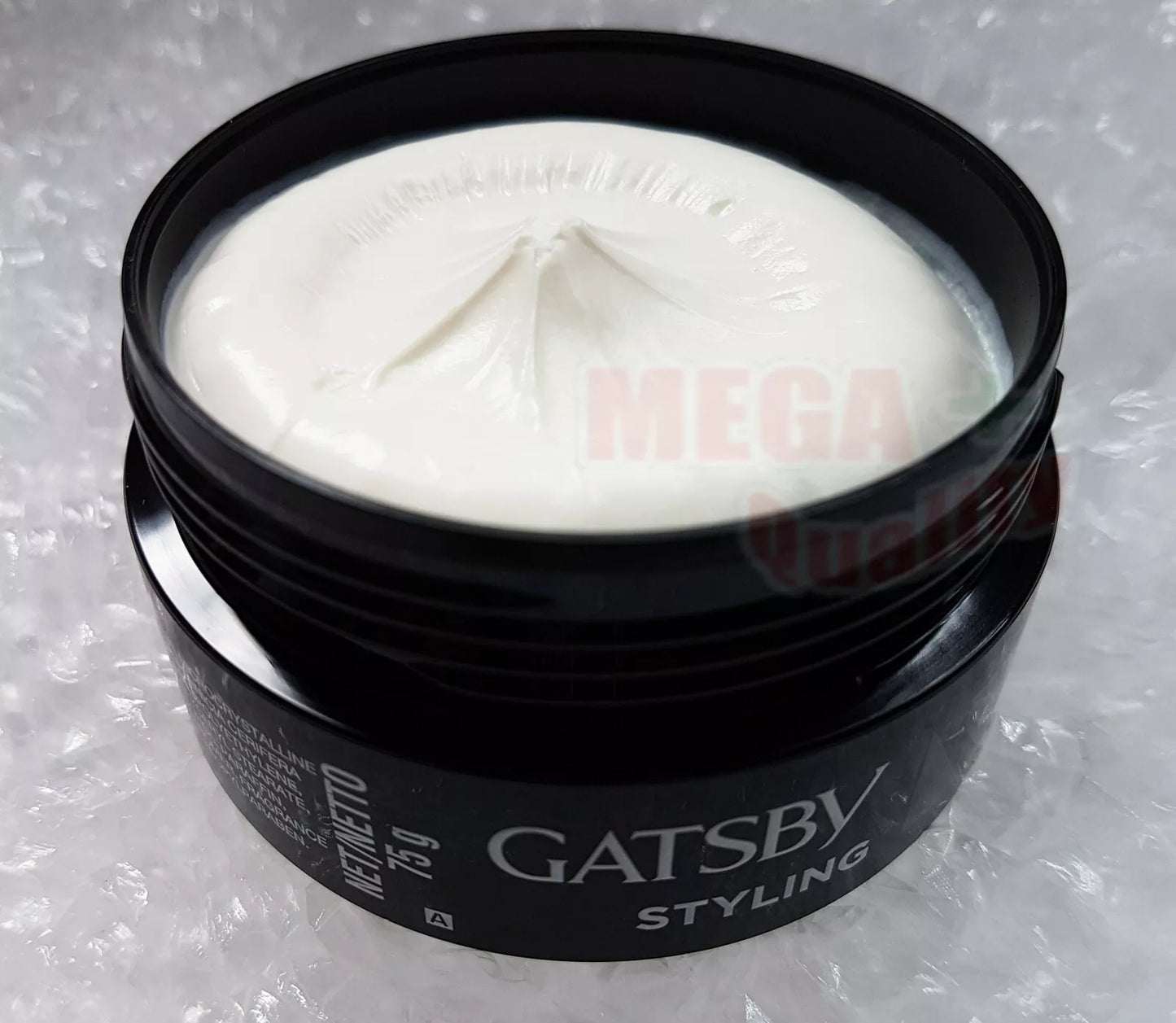 Opened Gatsby Hair Styling Wax Mat & Hard jar showing white matte wax texture