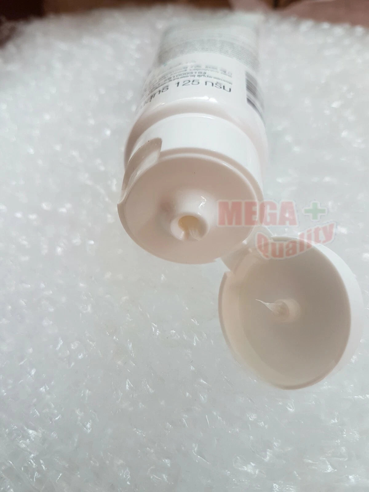 Dr Montri Acne Oil Control Foam open tube showing cream texture and dispenser cap