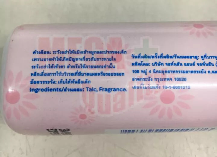  Close-up of Thai product usage and caution instructions on baby powder packaging