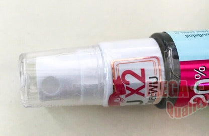 Twelve Plus Freesia Crush Mist body and hair perfume bottle lying on surface